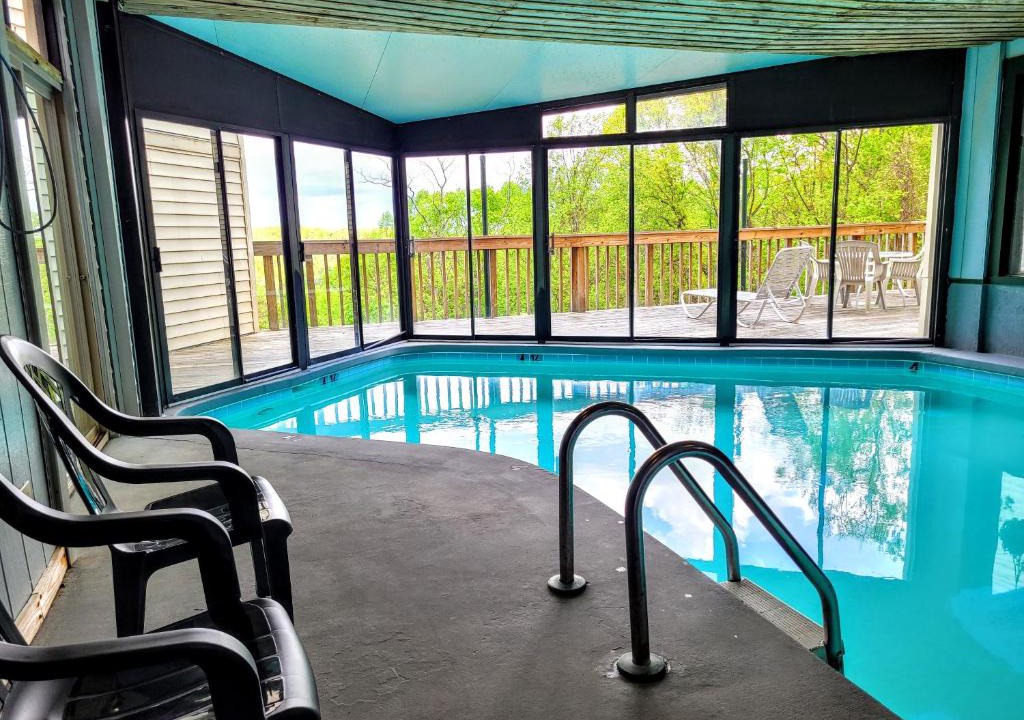 Chalet Village Apartment | Enjoy winter in the Smoky Mountains from your private BALCONY King bed, enjoy the view from the Pool, Hot tub, in the clubhouse