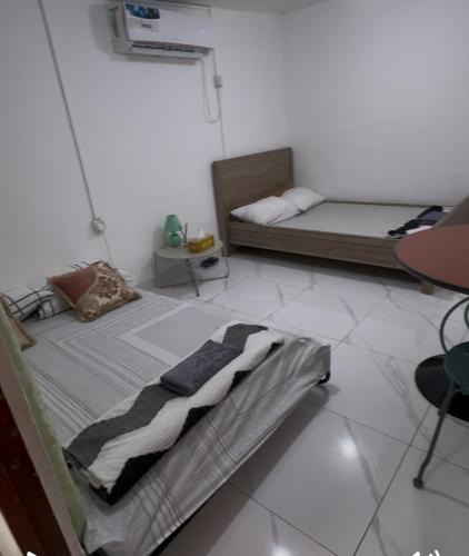 Madinat Zayed Villa | Js lodge studio type for 4 pax with tv kitchen and toilet