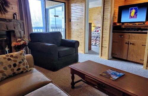 Chalet Village Apartment | Enjoy winter in the Smoky Mountains from your private BALCONY King bed, enjoy the view from the Pool, Hot tub, in the clubhouse
