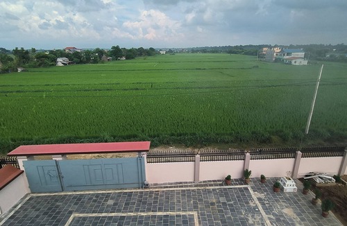 Bharatpur House | A two-bedroom home with a living room, kitchen, and garden feels like home.n