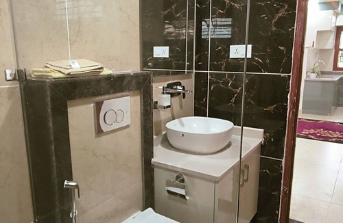 Bharatpur House | A two-bedroom home with a living room, kitchen, and garden feels like home.n