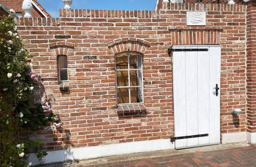 Greetsiel Apartment | FERNBLICK: Chic, colorful 2-room apartment with balcony in a top location directly on the Siel
