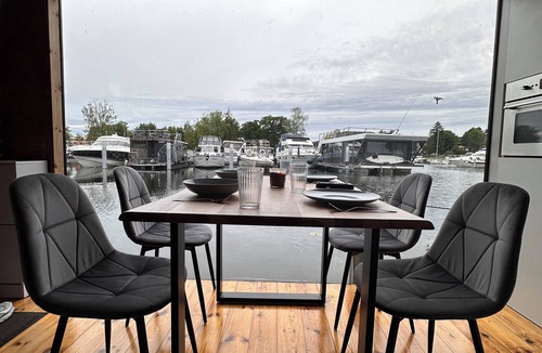 Schmoeckwitz Boat Rental | Houseboat with sauna & fireplace - pure relaxation on the water surrounded by nature