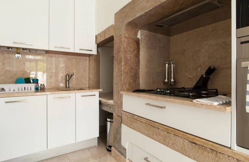 Santa Maria Maior Apartment | JOIVY Elegant 3BR Apt w/terrace in Baixa, 3mins to Lisbon Cathedral