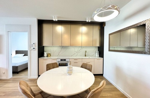 Trzebiatow Apartment | Lake pool view with private beach access Garage