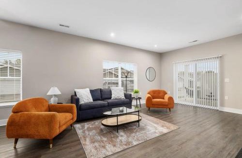 Grandville Apartment | Modern 4BR 4BA Two Unit Condo w Garage and Patio