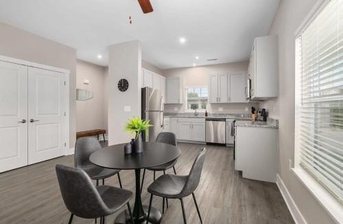 Grandville Apartment | Modern 4BR 4BA Two Unit Condo w Garage and Patio