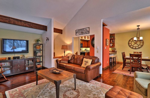 Plymouth House | Rustic home with a private hot tub, fireplace, cable, & washer/dryer
