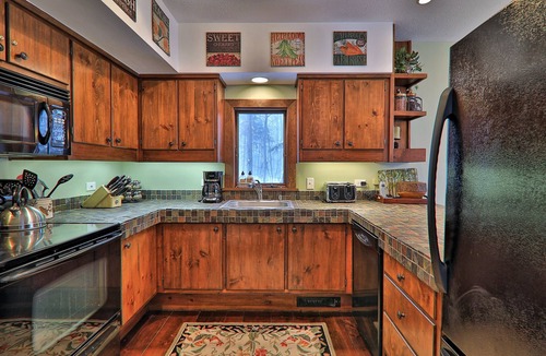 Plymouth House | Rustic home with a private hot tub, fireplace, cable, & washer/dryer