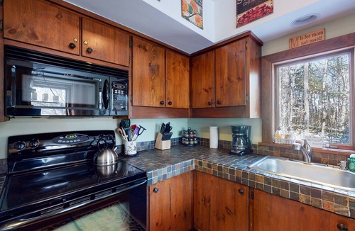 Plymouth House | Rustic home with a private hot tub, fireplace, cable, & washer/dryer