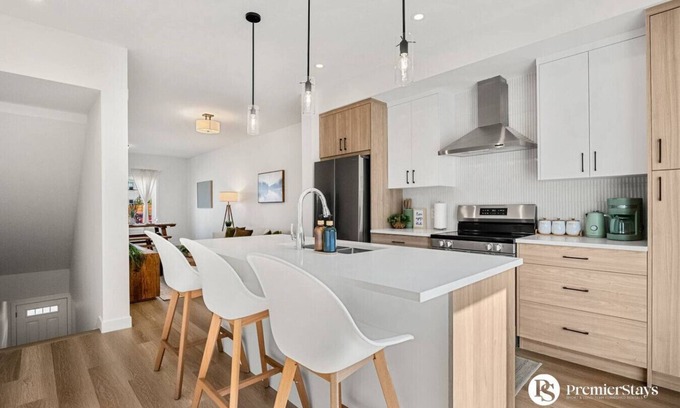 Springbank Hill House | Designer-Inspired Home » King Bed » Garage » AC