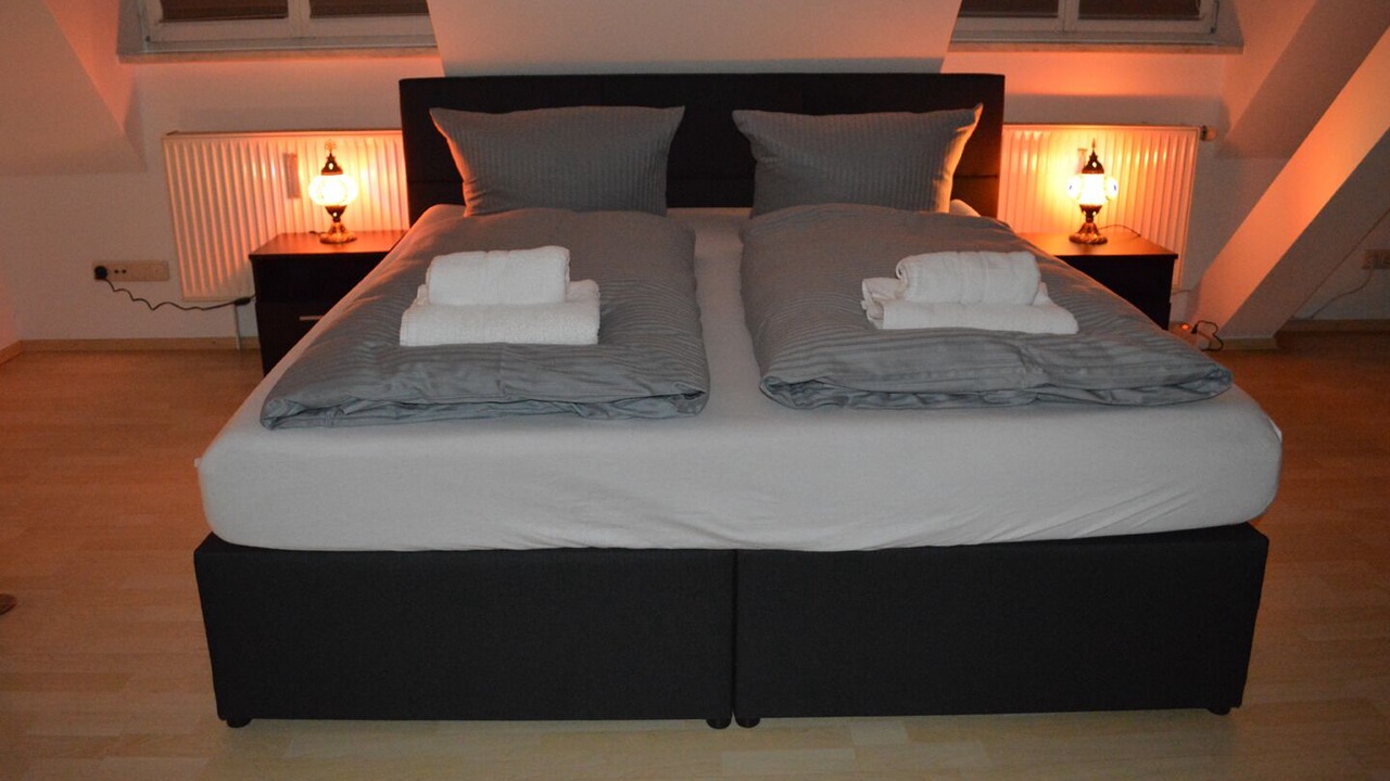 Photo of Bedroom in Ludwigsvorstadt-Kliniken