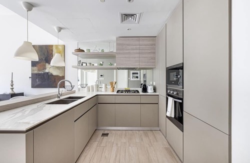 Madinat Zayed Apartment | Stylish 1BR Apartment with Community View